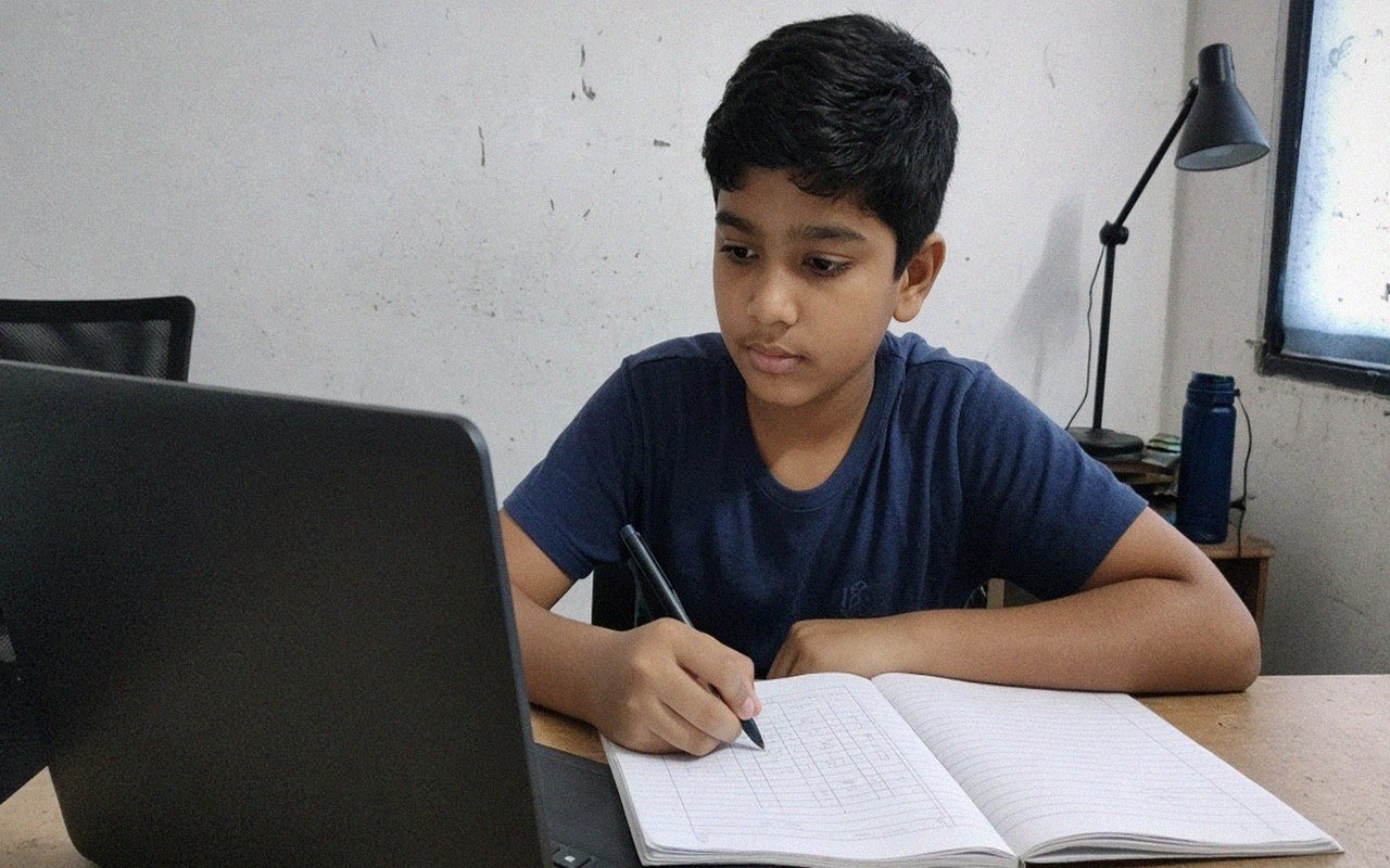 Parent and middle school student reviewing a MATHCOUNTS plan